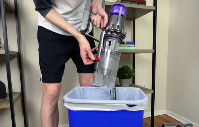 emptying Dyson V11 bin