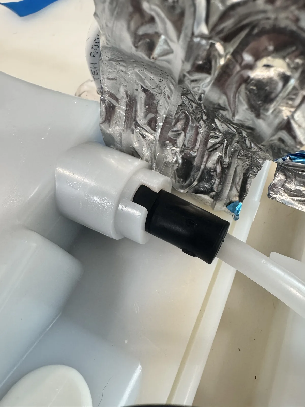 Frozen ice maker fill tube