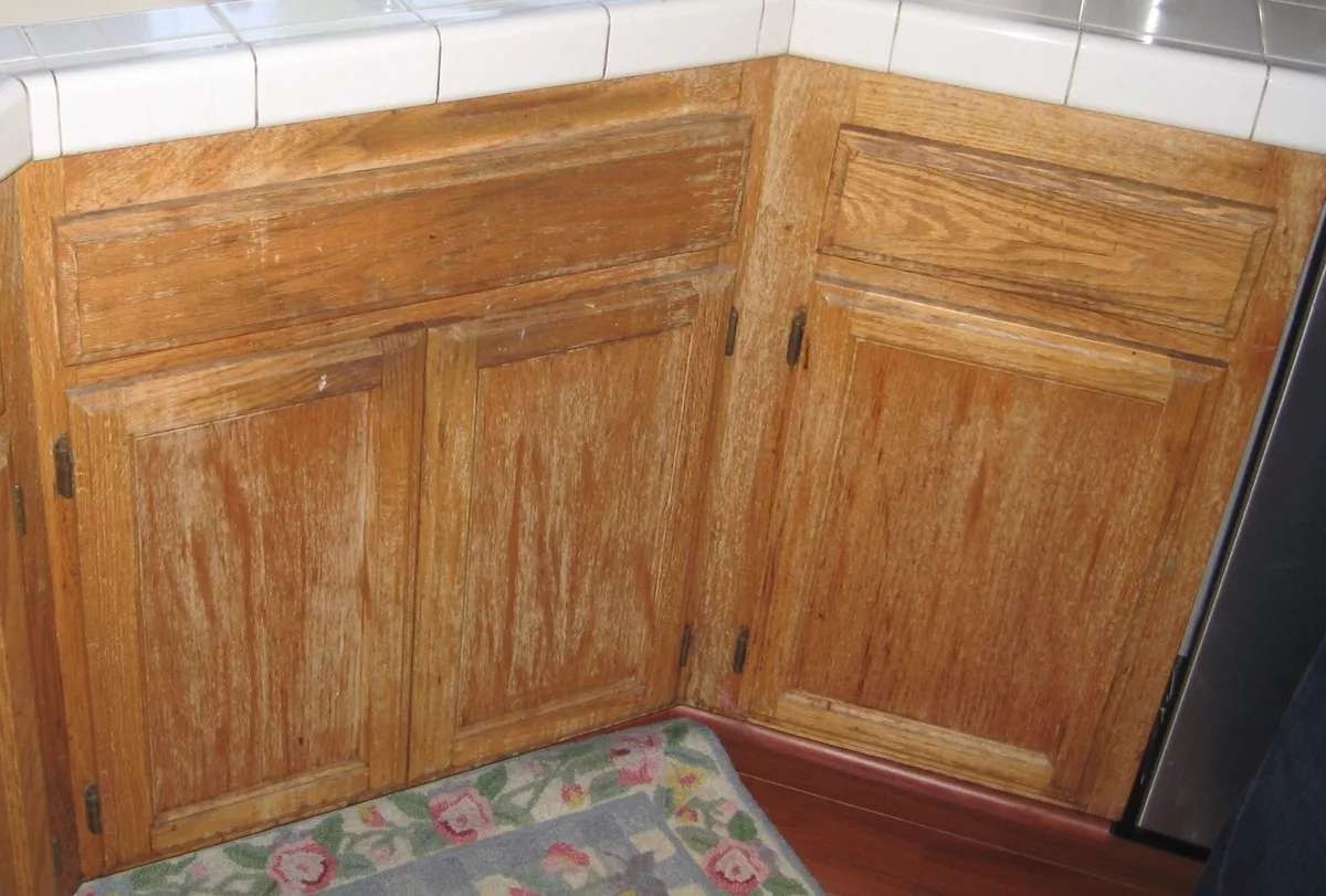 water damage on wood cabinets